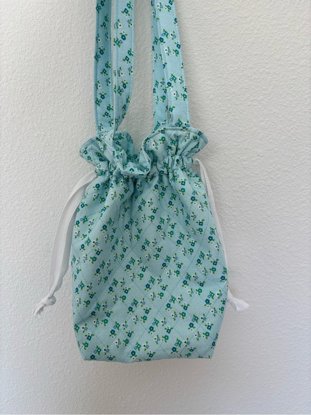 Light Blue Floral Quilted Drawstring Tote Bag